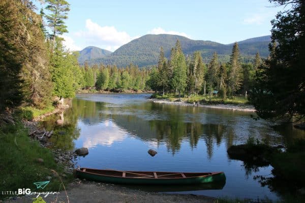 canoe in the river in the forest at gaspesie