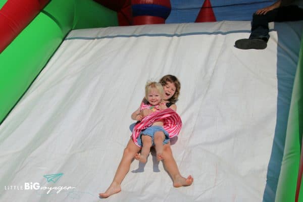 Big and Little J at a bouncy castle